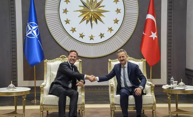 NATO Secretary General Mark Rutte, left, meets with Turkish Presidential Defense Industries Directorate Haluk Gorgun as he arrives ahead of the NATO Summit in Ankara, Turkey, Monday, July 6, 2026. (Osmancan Gürdoğan, Pool Photo via AP)