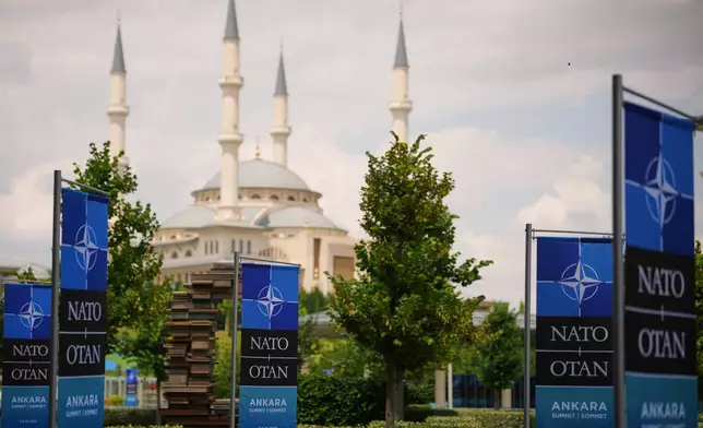 NATO banners in front of the Bestepe National Mosque ahead of the NATO Summit in Ankara, Turkey, Monday, July 6, 2026. (AP Photo/Emrah Gurel)