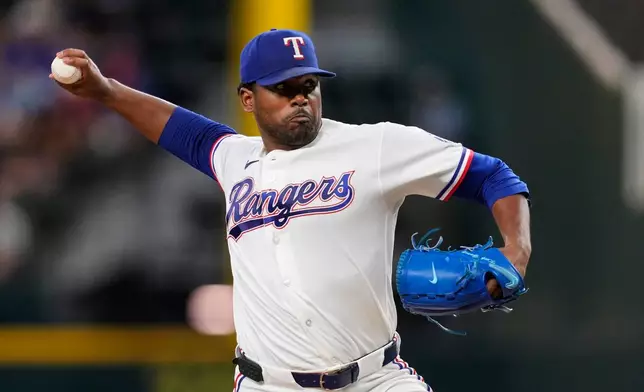 Texas Rangers pitcher Kumar Rocker throws to the Seattle Mariners in the first inning of a baseball game in Arlington, Texas, Monday, July 27, 2026. (AP Photo/Tony Gutierrez)