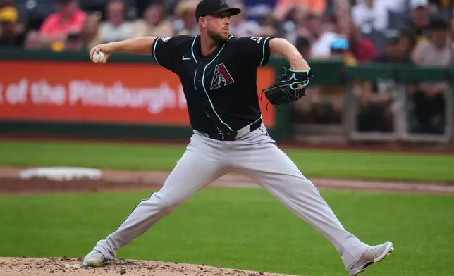 Arizona Diamondbacks pitcher Merrill Kelly delivers during the first inning of a baseball game against the Pittsburgh Pirates in Pittsburgh, Monday, July 27, 2026. (AP Photo/Gene J. Puskar)