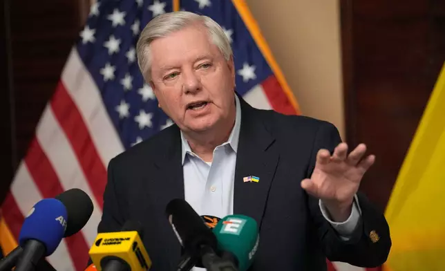 FILE - U.S. Sen. Lindsey Graham, R-S.C., gestures as he speaks to the media in Kyiv, Ukraine, March 18, 2024. (AP Photo/Vadim Ghirda, File)