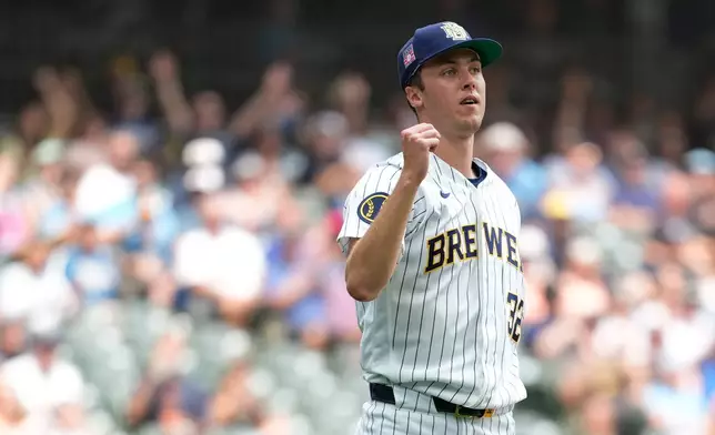Milwaukee Brewers' Jacob Misiorowski reacts after striking out Colorado Rockies' Hunter Goodman during the third inning of a baseball game Sunday, July 26, 2026, in Milwaukee. (AP Photo/Aaron Gash)