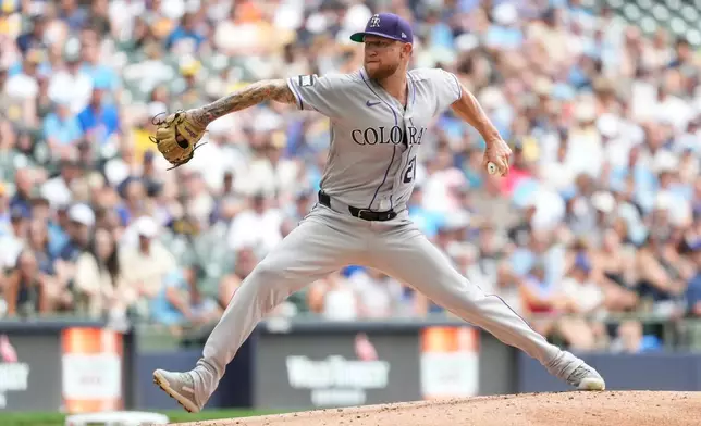 Colorado Rockies' Kyle Freeland pitches during the first inning of a baseball game against the Milwaukee Brewers, Sunday, July 26, 2026, in Milwaukee. (AP Photo/Aaron Gash)