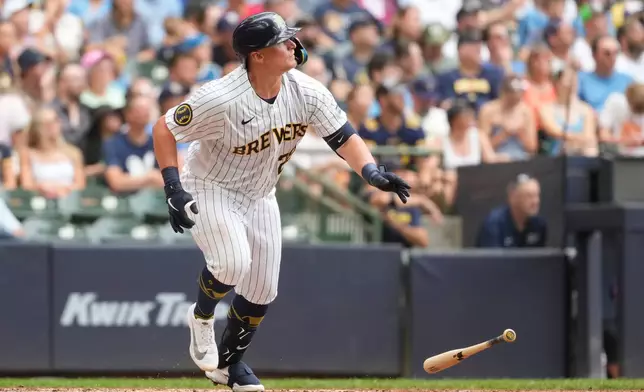 Milwaukee Brewers' Andrew Vaughn drops his bat after hitting a solo home run during the sixth inning of a baseball game against the Colorado Rockies, Sunday, July 26, 2026, in Milwaukee. (AP Photo/Aaron Gash)