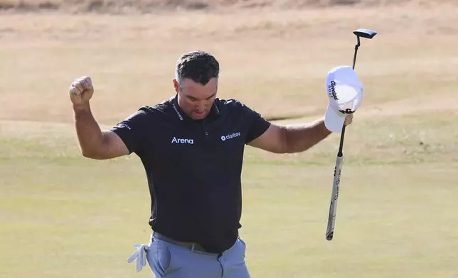 Ryan Fox of New Zealand celebrates on the 18th green after winning the British Open Golf championships at Royal Birkdale golf club, in Southport, England, Sunday, July 19, 2026. (AP Photo/Peter Morrison)