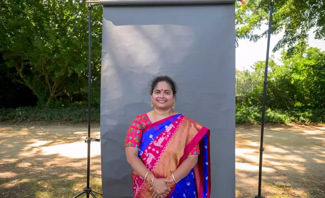New U.S. citizen Sritanaya Kamireddy, from India, poses for a portrait following a naturalization ceremony on Independence Day at George Washington's Mount Vernon, Saturday, July 4, 2026, in Alexandria, Va. (AP Photo/Rod Lamkey, Jr.)