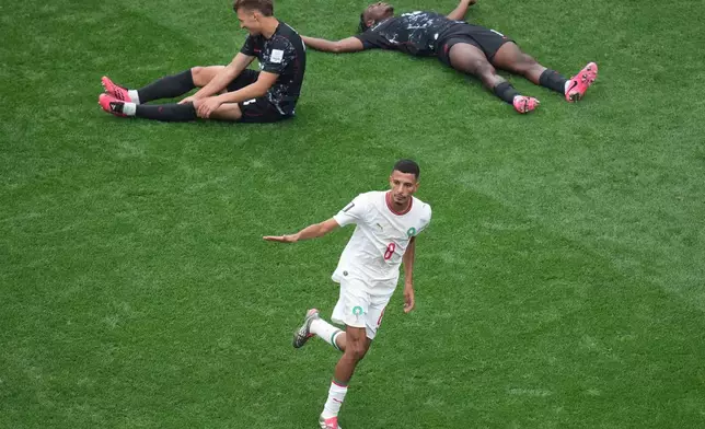 Morocco's Azzedine Ounahi (8) celebrates after scoring second goal during the World Cup round of 16 soccer match between Canada and Morocco in Houston, Saturday, July 4, 2026. (AP Photo/Eric Smith