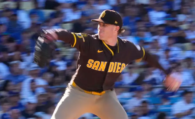 San Diego Padres starting pitcher Jp Sears throws to the plate during the fifth inning of a baseball game against the Los Angeles Dodgers,Sunday, July 5, 2026, in Los Angeles. (AP Photo/Mark J. Terrill)
