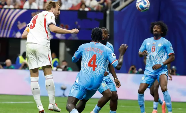 England's Harry Kane (9) scores his side's first goal against Congo during the World Cup round of 32 soccer match in Atlanta, Wednesday, July 1, 2026. (AP Photo/Erik S. Lesser)