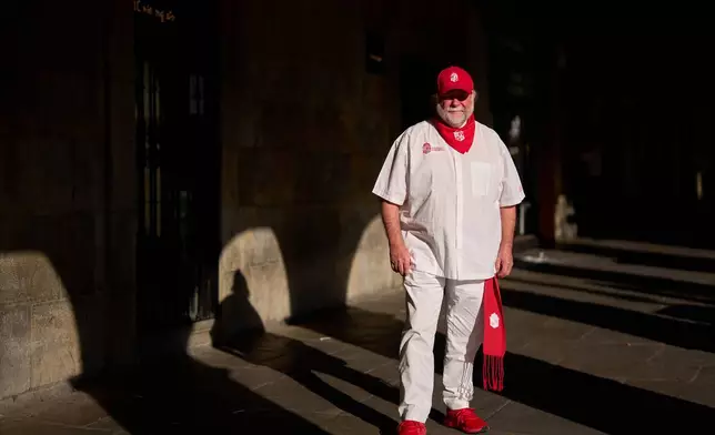 San Fermin tour operator Bruce Anderson poses in Pamplona, northern Spain, Thursday, July 2, 2026. (AP Photo/Miguel Oses)