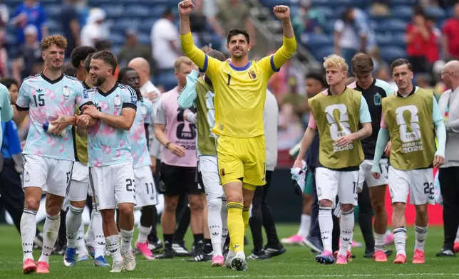 Belgium goalkeeper Thibaut Courtois (1) celebrates their win with teammates after the World Cup round of 32 soccer match between Belgium and Senegal in Seattle, Wednesday, July 1, 2026. (AP Photo/Abbie Parr)