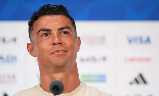 Portugal's Cristiano Ronaldo speaks to reporters during a press conference ahead of his team¥s World Cup round of 16 soccer match against Spain, Sunday, July 5, 2026, in Arlington, Texas, near Dallas. (AP Photo/Julio Cortez)