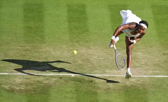 Coco Gauff of the United States serves during the third round women's singles match against Claire Liu of the United States at the Wimbledon Tennis Championships in London, Friday, July 3, 2026.(AP Photo/Brian Inganga)