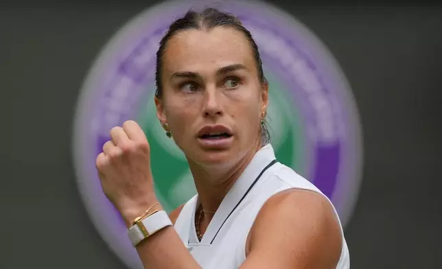 Aryna Sabalenka of Belarus celebrates a point against McCartney Kessler of the United States in their second round women's singles match, at Wimbledon Tennis Championships in London, Wednesday, July 1, 2026. (AP Photo/Kin Cheung)