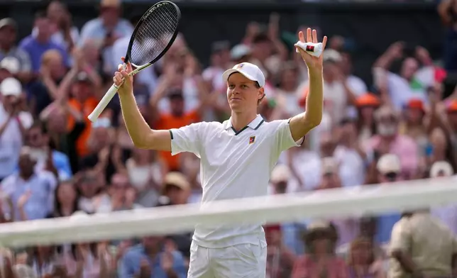 Jannik Sinner of Italy celebrates winning the men's singles match against Miomir Kecmanovic of Serbia during at the Wimbledon Tennis Championships in London, Monday, June 29, 2026.(AP Photo/Kin Cheung)