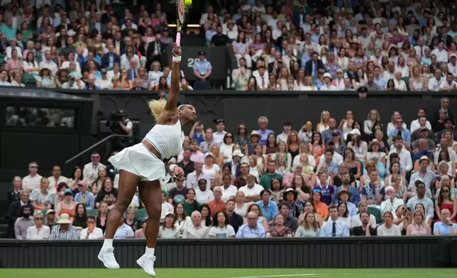 Serena Williams of the United States serves against Maya Joint of Australia in their first round women's singles match at the Wimbledon Tennis Championships in London, Tuesday, June 30, 2026. (AP Photo/Maja Smiejkowska)