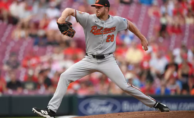 Baltimore Orioles pitcher Trevor Rogers throws during the third inning of a baseball game against the Cincinnati Reds in Cincinnati, Friday, July 3, 2026. (AP Photo/Tanner Pearson)
