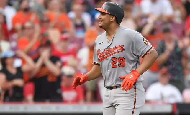 Baltimore Orioles' Samuel Basallo reacts after hitting a two-run home run during the third inning of a baseball game against the Cincinnati Reds in Cincinnati, Friday, July 3, 2026. (AP Photo/Tanner Pearson)