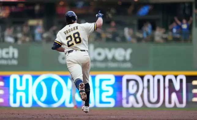 Milwaukee Brewers' Andrew Vaughn rounds the bases after hitting a two-run home run during the third inning of a baseball game against the New York Mets, Monday, July 20, 2026, in Milwaukee. (AP Photo/Aaron Gash)
