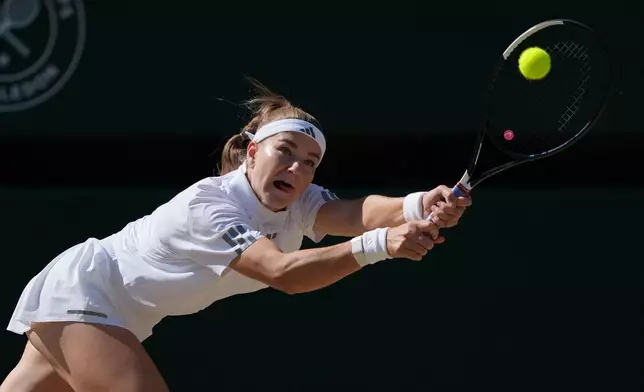 Karolina Muchova of Czech Republic returns the ball to Linda Noskova of Czech Republic in the women's singles final at Wimbledon Tennis Championships in London, Saturday, July 11, 2026. (AP Photo/Kin Cheung)