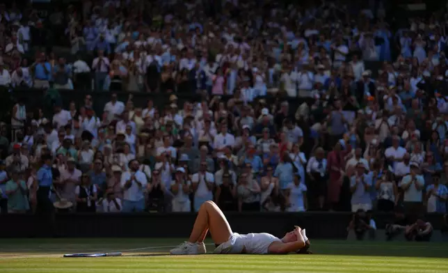 Linda Noskova of Czech Republic reacts after winning against Karolina Muchova of Czech Republic in the women's singles final at Wimbledon Tennis Championships in London, Saturday, July 11, 2026. (AP Photo/Kirsty Wigglesworth)