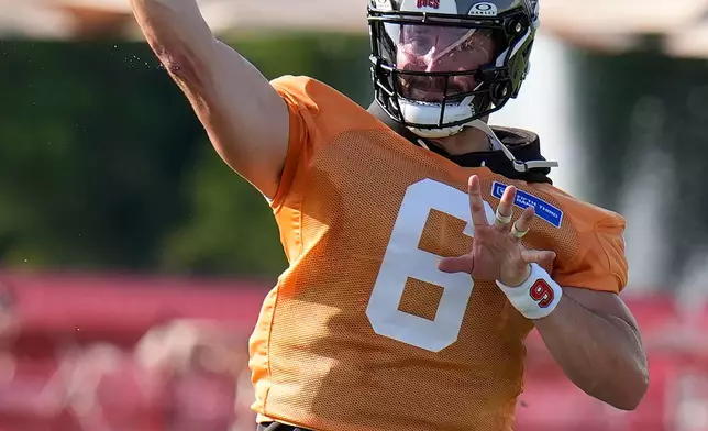 Tampa Bay Buccaneers quarterback Baker Mayfield (6) throws a pass during an NFL football training camp practice Wednesday, July 29, 2026, in Tampa, Fla. (AP Photo/Chris O'Meara)