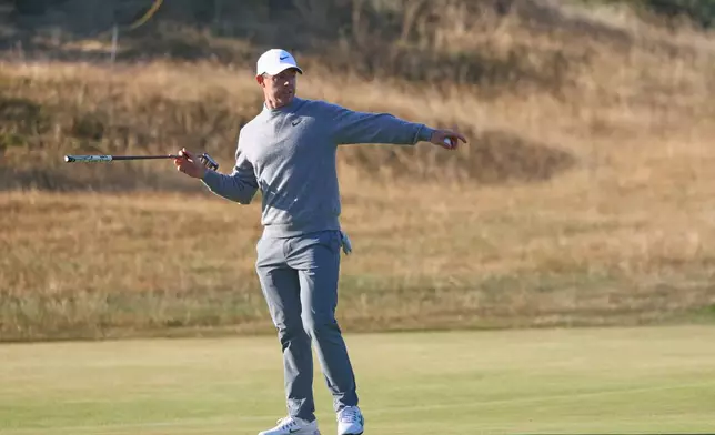 Rory McIlroy of Northern Ireland gestures after putting on the 4th green during a practice round for the British Open Golf championships at Royal Birkdale golf club, in Southport, England, Tuesday, July 14, 2026. (AP Photo/Peter Morrison)