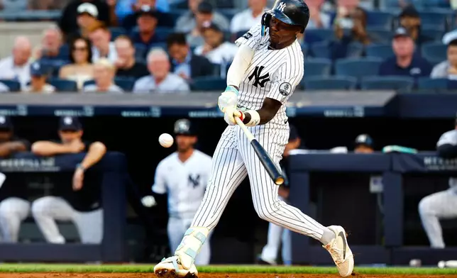 New York Yankees' Jazz Chisholm Jr. hits a home run against the Pittsburgh Pirates during the first inning of a baseball game, Monday, July 20, 2026, in New York. (AP Photo/Noah K. Murray)
