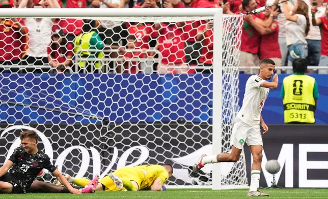 Morocco's Azzedine Ounahi (8), celebrates after scoring their second goal during the World Cup round of 16 soccer match between Canada and Morocco in Houston, Saturday, July 4, 2026. (AP Photo/Ashley Landis)