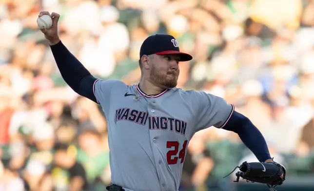 Washington Nationals pitcher Cade Cavalli throws to the Athletics during the second inning of a baseball game Friday, July 17, 2026, in West Sacramento, Calif. (AP Photo/Sara Nevis)