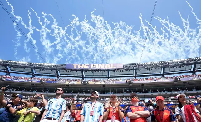 Fireworks explode before the start of the World Cup championship final soccer match between Spain and Argentina in East Rutherford, N.J., Sunday, July 19, 2026. (AP Photo/Jacquelyn Martin)