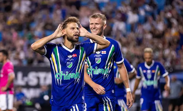 MLS All-Star Philip Zinckernagel (11) celebrates after scoring during the MLS All-Star soccer game Wednesday, July 29, 2026, in Charlotte, N.C. (AP Photo/Scott Kinser)