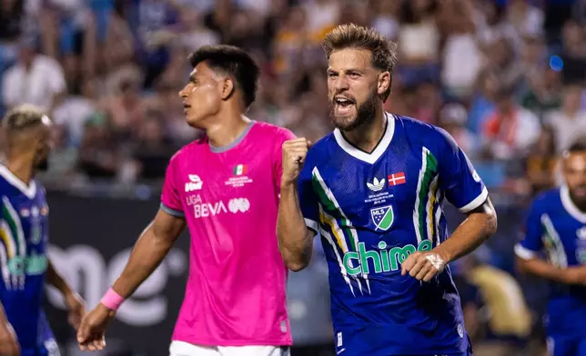 MLS All-Star Philip Zinckernagel (11) celebrates after scoring during the MLS All-Star soccer game Wednesday, July 29, 2026, in Charlotte, N.C. (AP Photo/Scott Kinser)