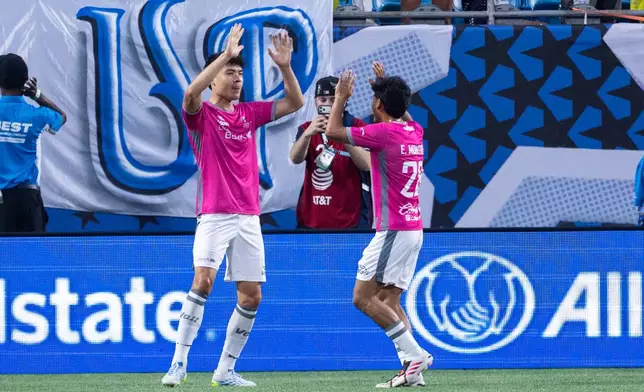 Liga MX All-star Luis Rey (16) celebrates a goal with Jesus Gallardo (23) during the MLS All-Star soccer game Wednesday, July 29, 2026, in Charlotte, N.C. (AP Photo/Scott Kinser)