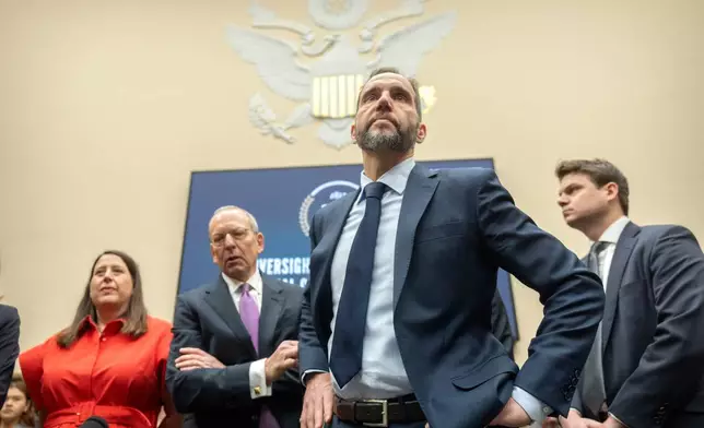 FILE - Former Justice Department special counsel Jack Smith, second from right, arrives before a hearing of the House Judiciary Committee at the Capitol in Washington, Jan. 22, 2026. (AP Photo/Mark Schiefelbein, File)