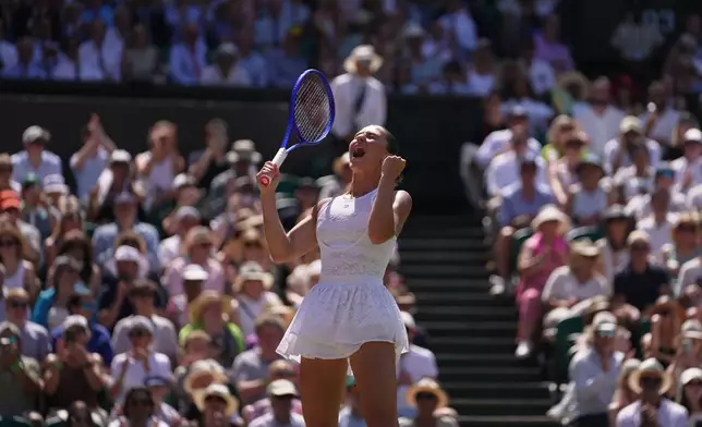 Marta Kostyuk of Ukraine celebrates her victory against Jasmine Paolini of Italy in their quarter-final women's singles match at the Wimbledon Tennis Championships in London, Wednesday, July 8, 2026. (AP Photo/Brian Inganga)