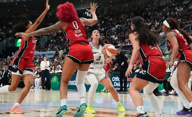 Toronto Tempo's Marina Mabrey (3) looks to shoot on the Washington Mystics defence during the first half of a WNBA basketball game in Toronto on Tuesday, July 14, 2026. (Chris Young/The Canadian Press via AP)