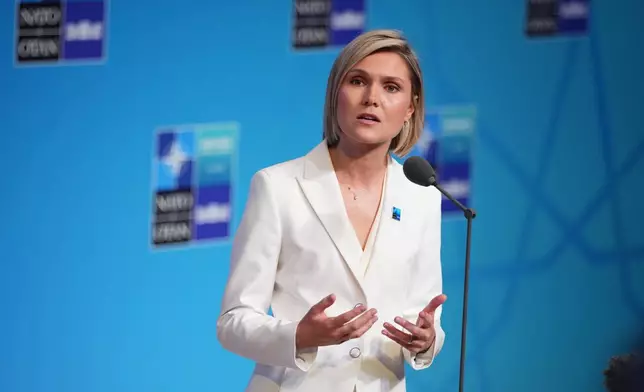Iceland's Prime Minister Kristrun Frostadottir speaks as she arrives for the NATO summit in Ankara, Turkey, Wednesday, July 8, 2026. (AP Photo/Emrah Gurel)
