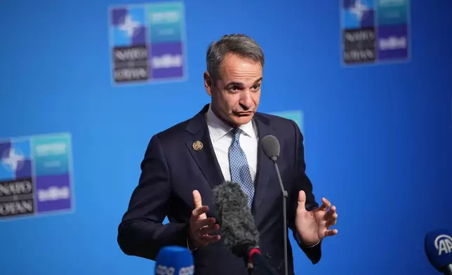 Greece's Prime Minister Kyriakos Mitsotakis speaks as he arrives for the NATO summit in Ankara, Turkey, Wednesday, July 8, 2026. (AP Photo/Emrah Gurel)