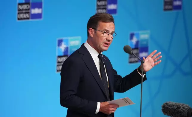 Sweden's Prime Minister Ulf Kristersson speaks as he arrives for the NATO summit in Ankara, Turkey, Wednesday, July 8, 2026. (AP Photo/Emrah Gurel)