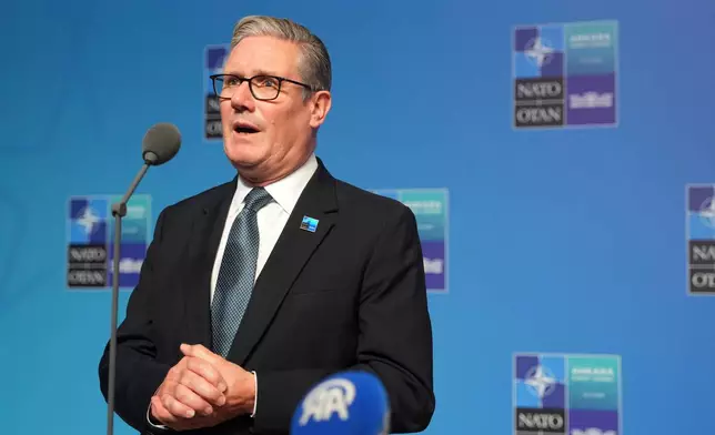 Britain's Prime Minister Keir Starmer speaks to reporters upon arrival for the NATO summit in Ankara, Turkey, Wednesday, July 8, 2026. (AP Photo/Alastair Grant, Pool)