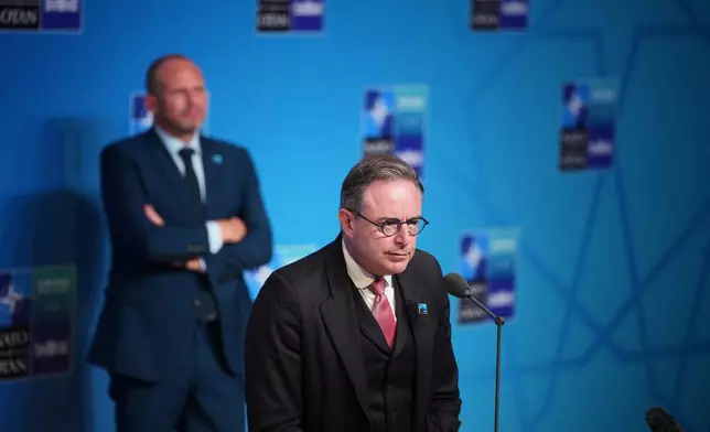 Belgium's Prime Minister Bart De Wever, right, speaks as he arrives for the NATO summit in Ankara, Turkey, Wednesday, July 8, 2026. (AP Photo/Emrah Gurel)