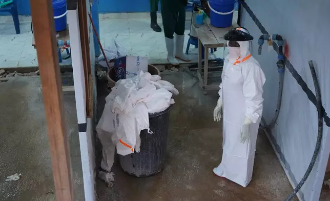 A health worker stands at an ebola treatment centre in Bunia, Congo, Monday, July 20, 2026. (AP Photo/Prosper Heri Ngorora)