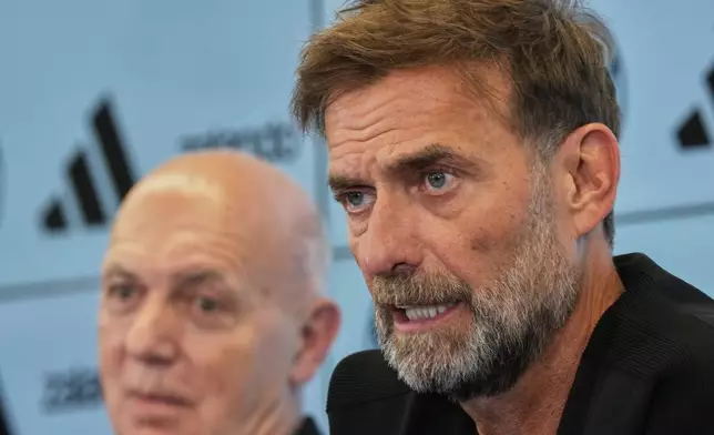 Newly appointed head coach of the German national soccer team Juergen Klopp attends a news conference at the headquarters of the German Football Association DFB in Frankfurt, Germany, Friday, July 24, 2026. (AP Photo/Michael Probst)