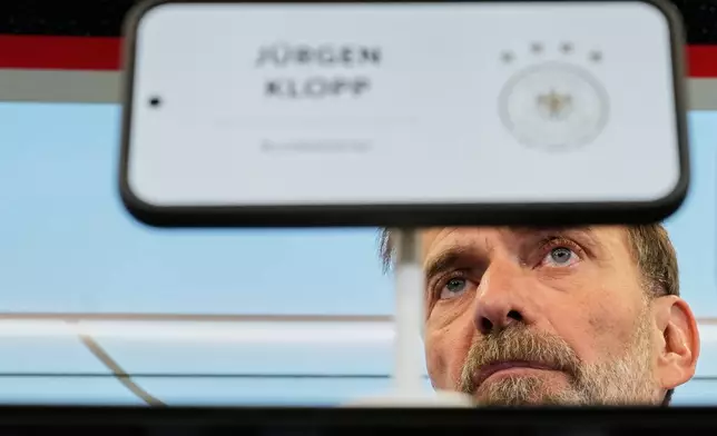Newly appointed head coach of the German national soccer team Juergen Klopp attends a news conference at the headquarters of the German Football Association DFB in Frankfurt, Germany, Friday, July 24, 2026. (AP Photo/Michael Probst)