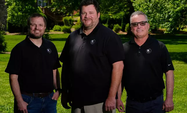 Andrew Leeper, left, Will Minkoff and Tom Johnstone, right, of Nashville Severe Weather, pose for a portrait Monday, April 20, 2026, in Nashville, Tenn. (AP Photo/George Walker IV)