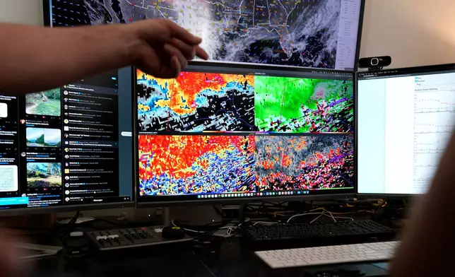 Weather information is displayed on a monitor at the Nashville Severe Weather headquarters Monday, April 20, 2026, in Nashville, Tenn. (AP Photo/George Walker IV)
