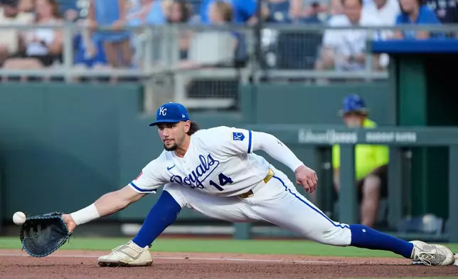 Kansas City Royals first baseman Jac Caglianone makes the catch for the out on Tampa Bay Rays designated hitter Yandy Díaz during the fourth inning of a baseball game Thursday, July 2, 2026, in Kansas City, Mo. (AP Photo/Charlie Riedel)