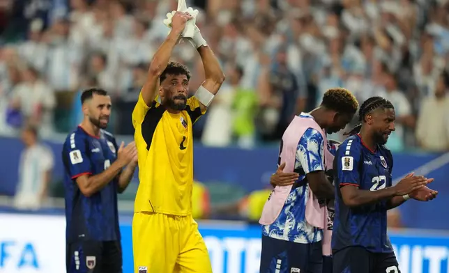 Cape Verde goalkeeper Vozinha (1) applauds the crowd as he leaves after the World Cup round of 32 soccer match between Argentina and Cape Verde in Miami Gardens, Fla., Friday, July 3, 2026. (AP Photo/Lynne Sladky)