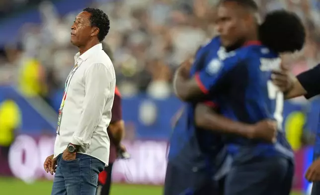 Cape Verde head coach Bubista stands on the pitch after the World Cup round of 32 soccer match between Argentina and Cape Verde in Miami Gardens, Fla., Friday, July 3, 2026. (AP Photo/Lynne Sladky)